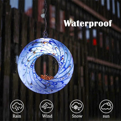 VCUTEKA Bird Feeder Solar Fly Through Bird Feeders for Outside Hanging with Round Shape Glass Container to Attract Wild Birds for Garden Decor, Solar Birdfeeder as Gift for Lovers, Light Blue 8-Inch