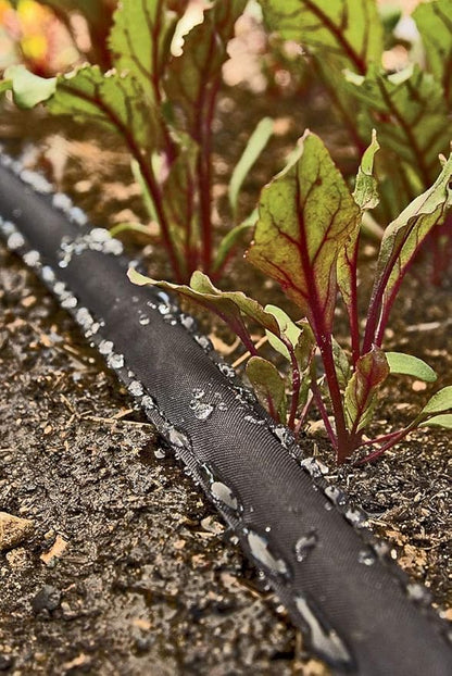 Rocky Mountain Goods 25 Foot Flat Weeper Soaker Hose - Drip Irrigation - Double Layer Design - Saves 70% Water - Consistent Drip Entire Length of Hose - Includes 3 Pressure Reducing Discs